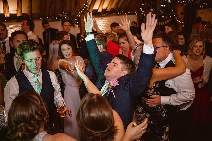 guests dancing at wedding at ufton court.jpg