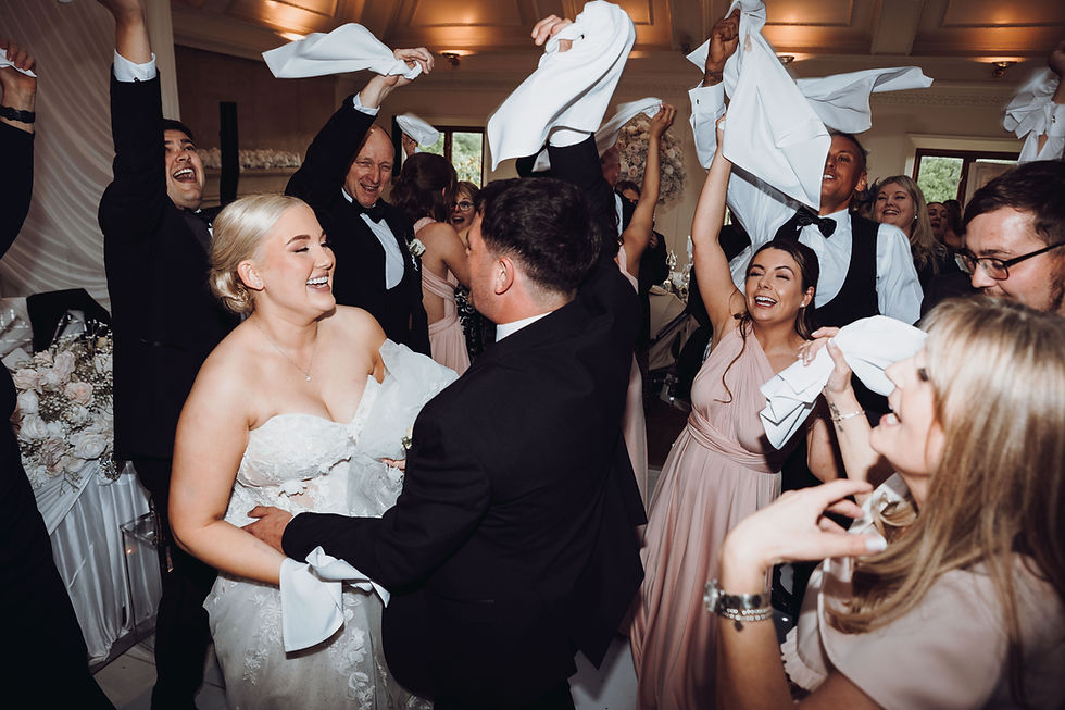 Eye-level view of a bride and groom sharing a quiet moment outdoors