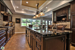 vinyl-plank-flooring-Kitchen-Traditional-with-dark-cabinets-granite-granite