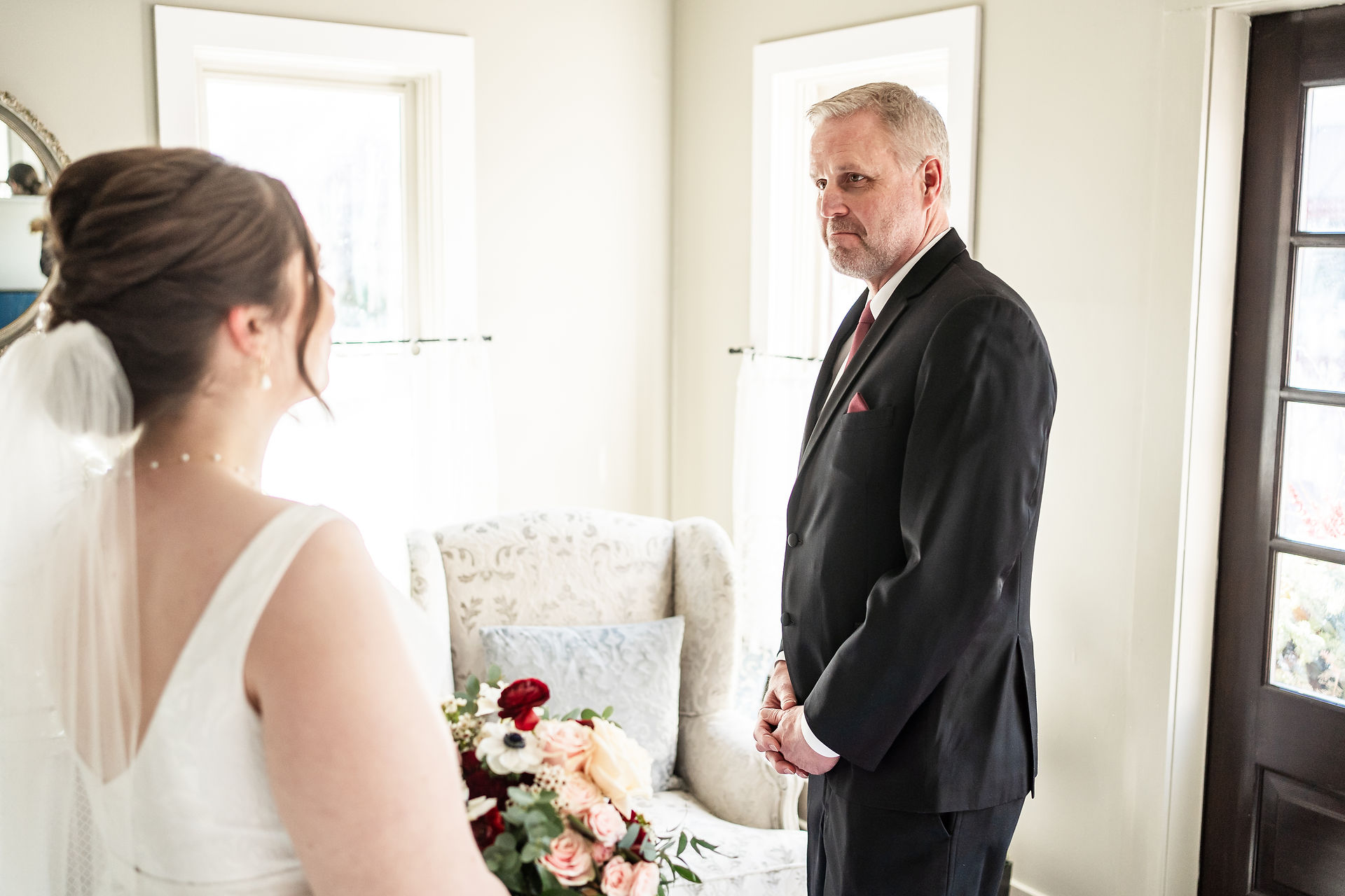 Dad seeing his daughter for the first time on her wedding day