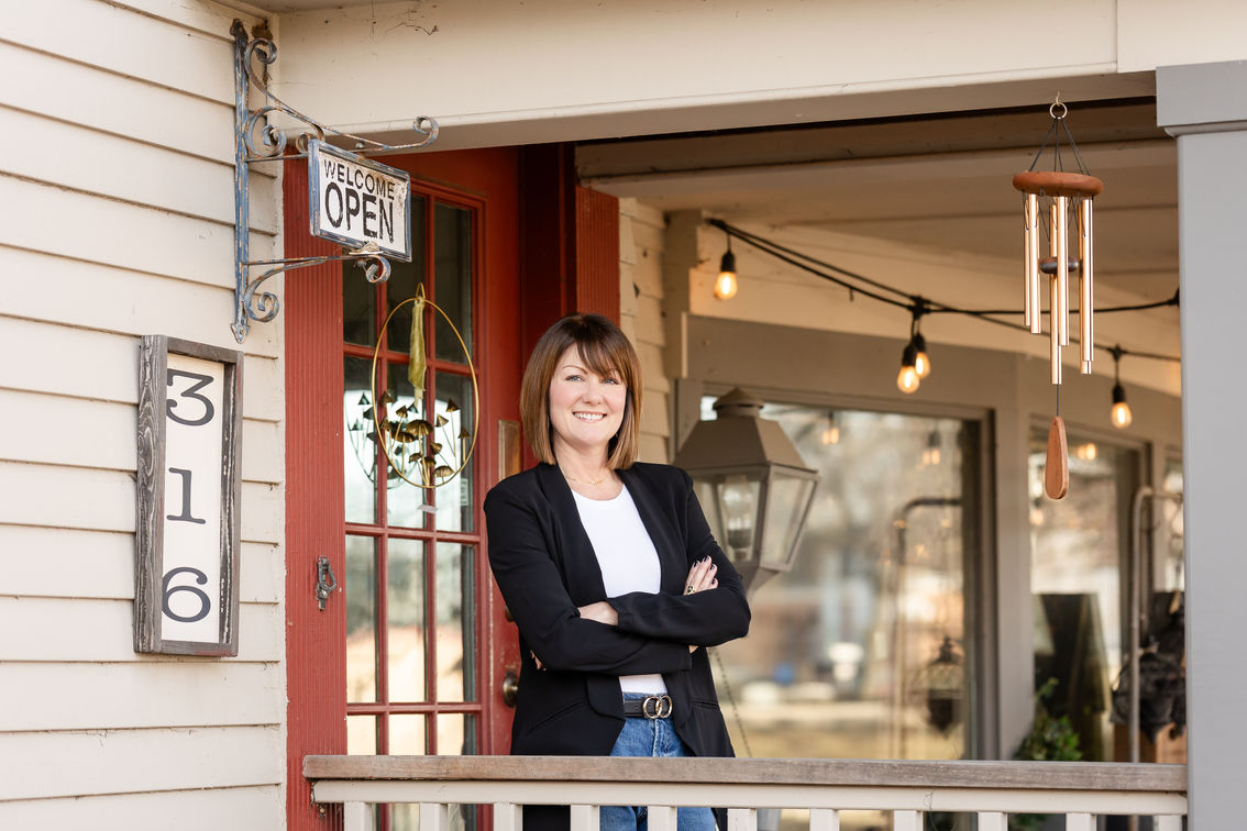 Relator in front of Country Naturals in downtown Geneva