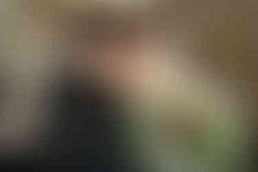 bride and groom touching foreheads