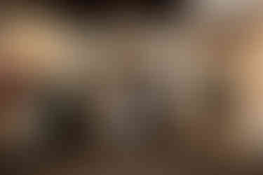 Bride and groom excitedly run into room