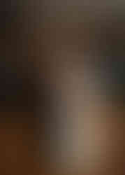 bride posing with women who caught the bouquet