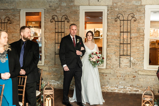 bride and father walking down aisle