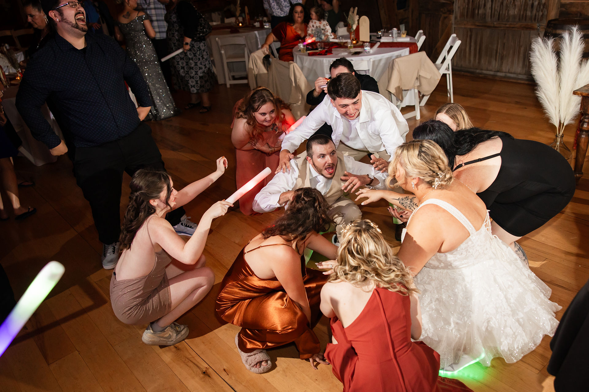 Wedding guests getting low on the dance floor