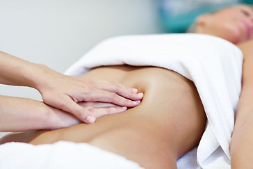 Woman getting an abdominal massage