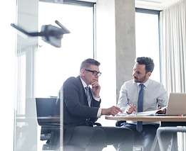 Professional business coaching leading coaching meeting with executive client