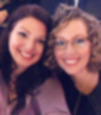 Emily Depke and best friend Jessica Riddle smiling at a concert.