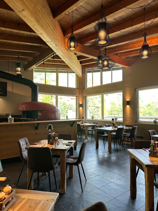 Restaurant Pizzeria Mangia in der Saalbach Hinterglemm Unterkunft - Saalbach Suites by Alps Resorts