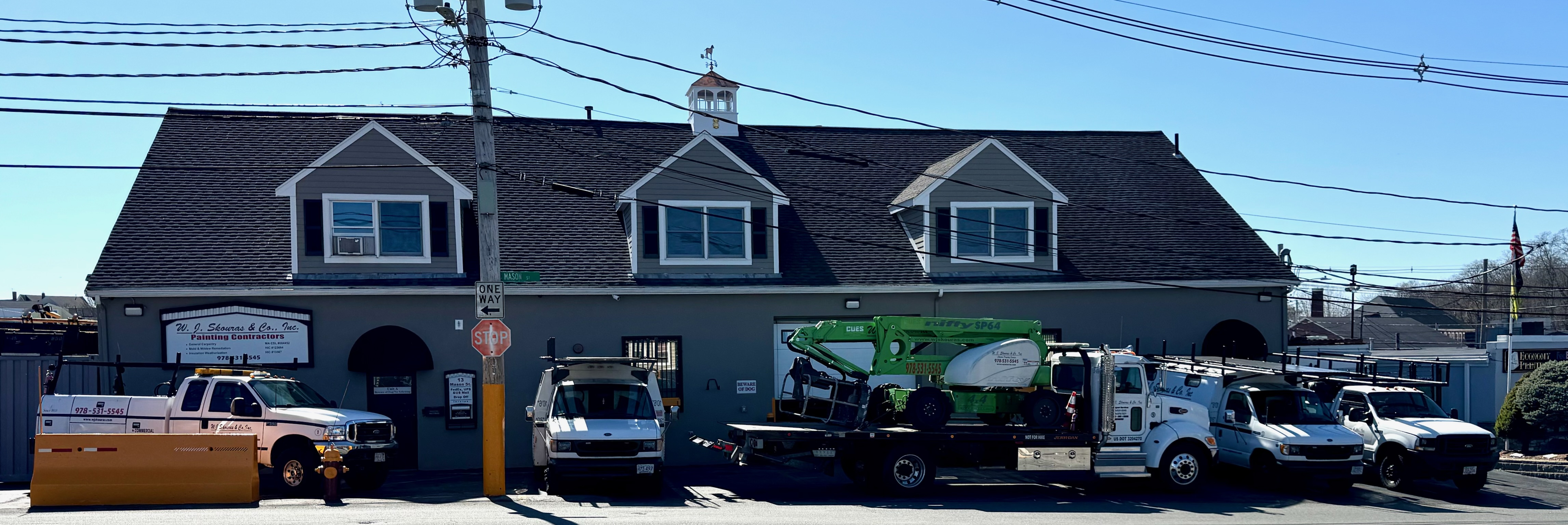 W.J. Skouras shop exterior and company fleet panoramic view