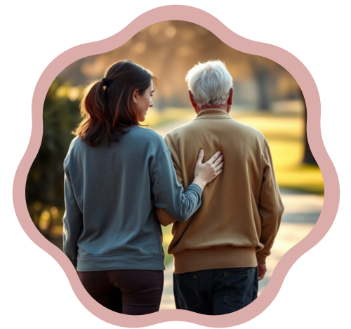 A family caregiver supports an elderly man by placing her hand on his back.