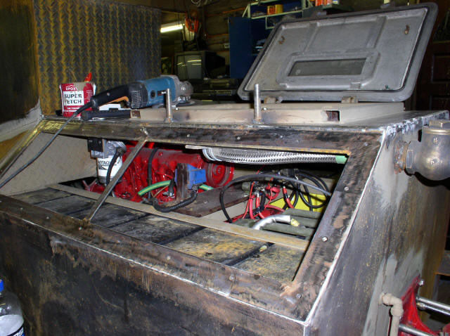 Access Panel showing Battery and engine compartment