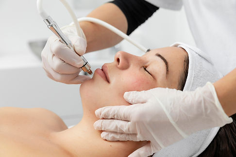 young-woman-having-skincare-treatment.jpg