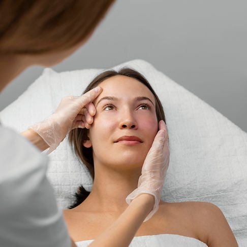 beautician-with-female-client-salon-face-care-routine.jpg
