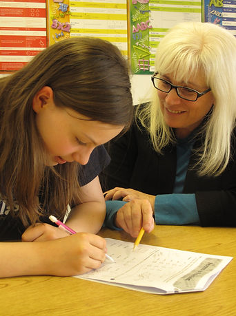 Dimona works with a student
