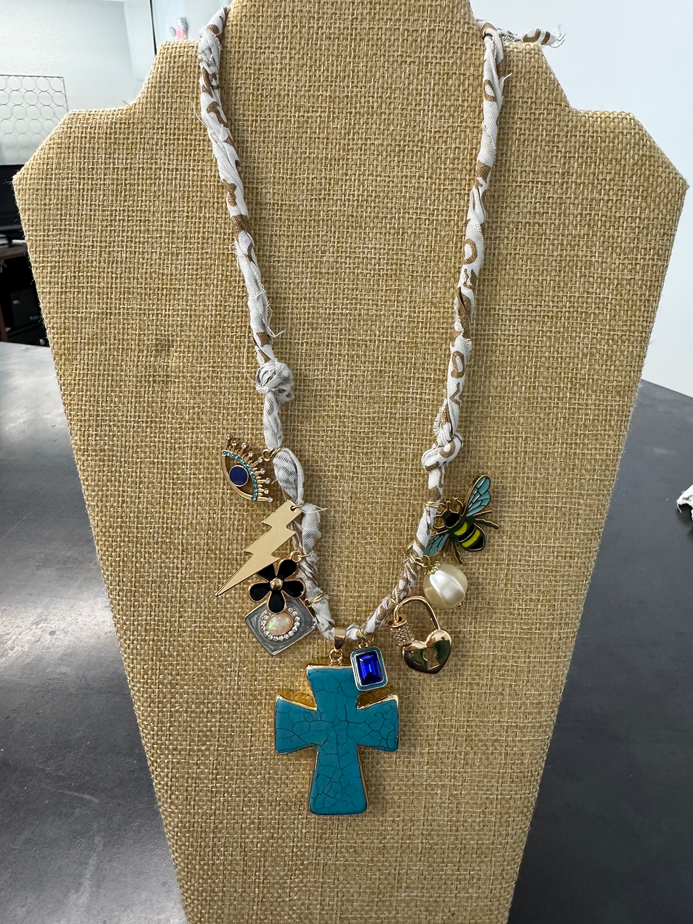 Thumbnail: 9 Charm Bandana  Necklace by Marilyn Broussard