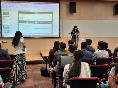 Image of Megha delivering a talk at Microsoft