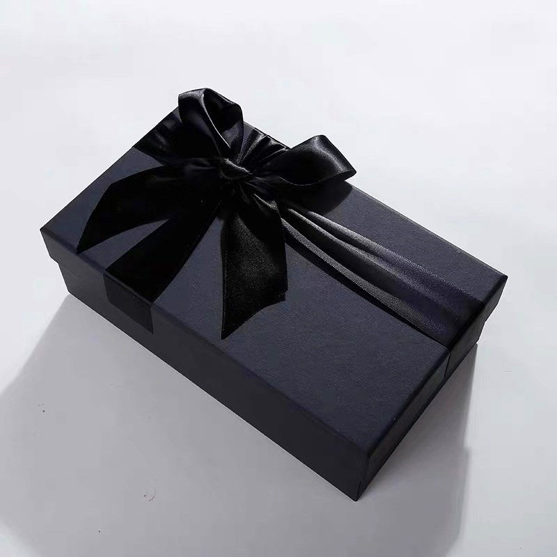 Thumbnail: Luxury Black color paper gift box with a ribbon bow to pack gift