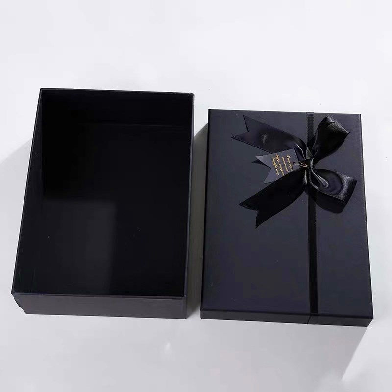 Thumbnail: Luxury Black color paper gift box with a ribbon bow to pack gift