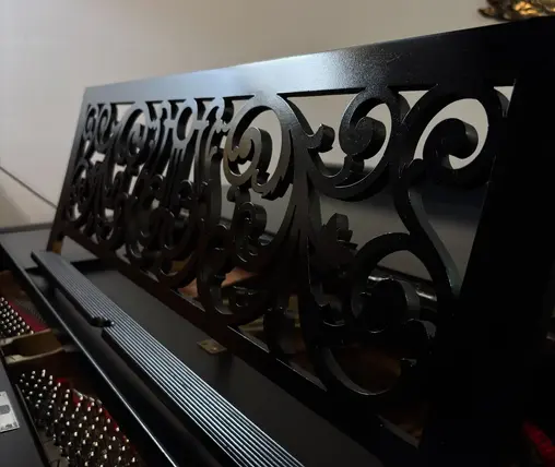 Mason & Hamlin Model A grand piano music rack with wood detailing at Rockafellow Piano in San Antonio, Texas