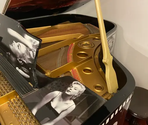 Open lid view of Knabe grand piano showing interior and Marilyn Monroe Hollywood design, premium restoration by Rockafellow Piano.