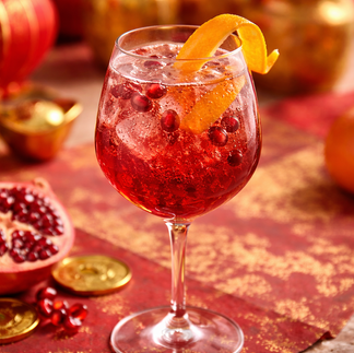 Festive pomegranate prosecco spritz celebration