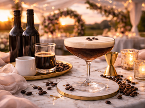 Low-ABV espresso martini served in a coupe glass with coffee bean garnish at a wedding-inspired bar setup