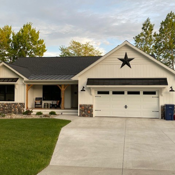 Modern Farmhouse Spec home with high end finishes built by J Hoffman Homes in Cadillac, Michigan.