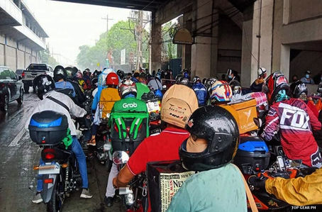 Respect the Road: Why Riders Should Avoid Using Flyovers and Overpasses as Rain Shelters