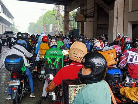 Respect the Road: Why Riders Should Avoid Using Flyovers and Overpasses as Rain Shelters