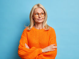 Woman thinking happily 