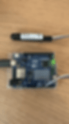 Arduino UNO R4 connected to an FG-3+ sensor, showcasing a setup for data collection.