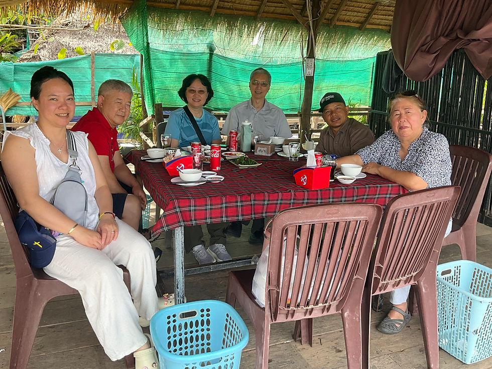 Eating by the Mei Gong River
