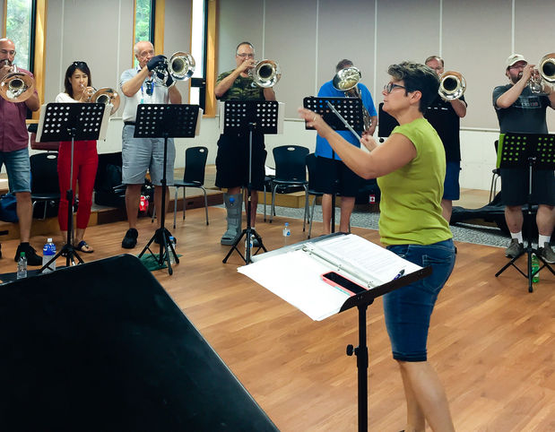 Yvette conducting a rehearsal, Optimists Alumni (Jeju, South Korea, 2019)