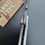 Thumbnail: Strider Hybrid SnG Gray Gunner Grip Flamed Ti Handle Tiger Stripe Blade