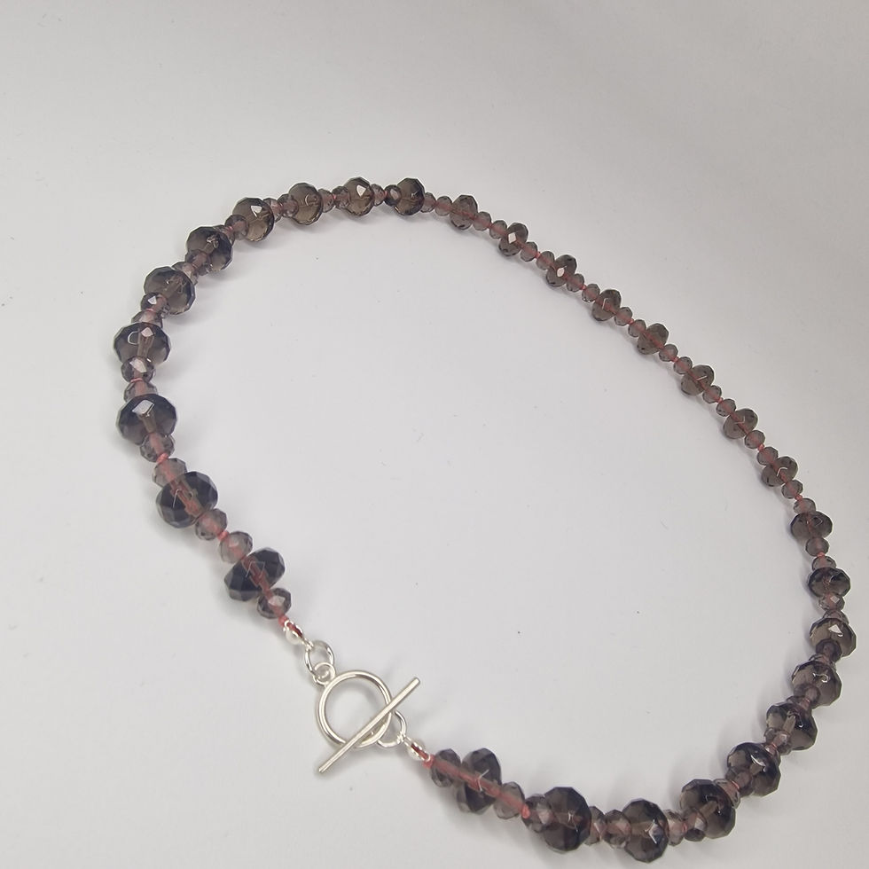 Thumbnail: Hand knotted Gradiated smokey quartz necklace