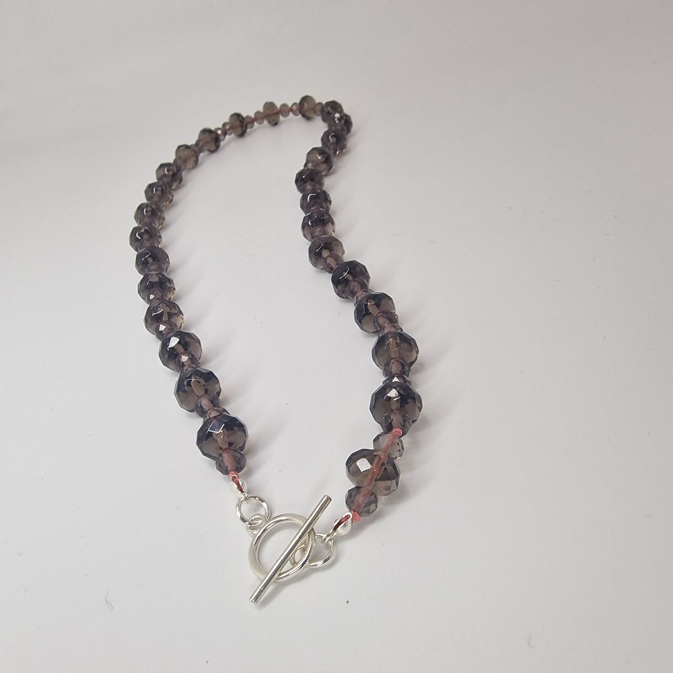 Thumbnail: Hand knotted Gradiated smokey quartz necklace