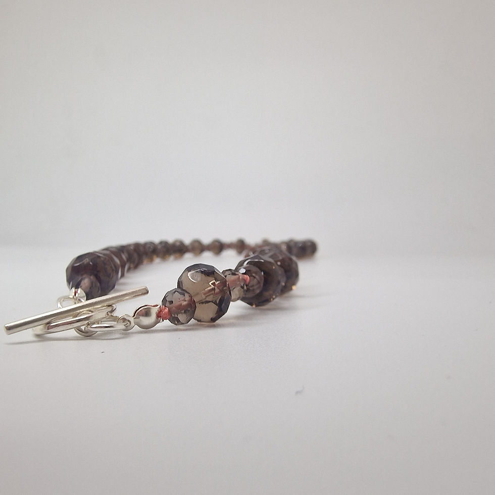 Thumbnail: Hand knotted Gradiated smokey quartz necklace