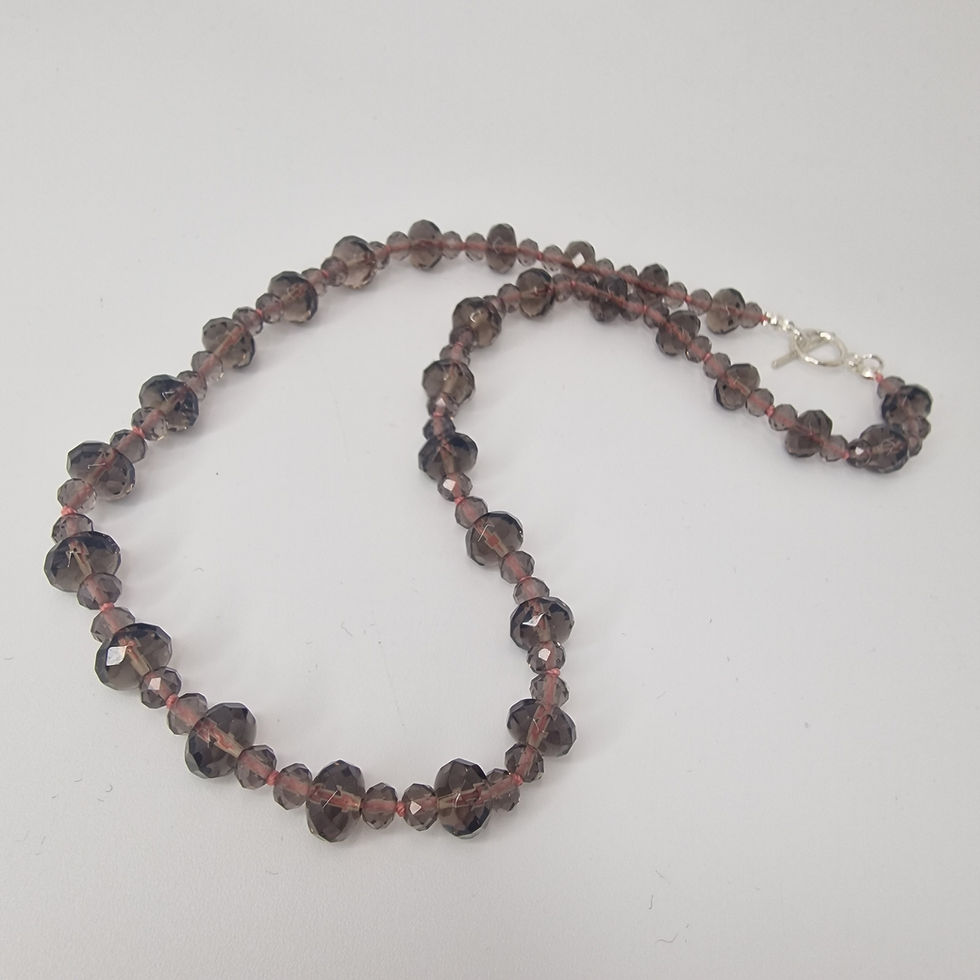 Thumbnail: Hand knotted Gradiated smokey quartz necklace
