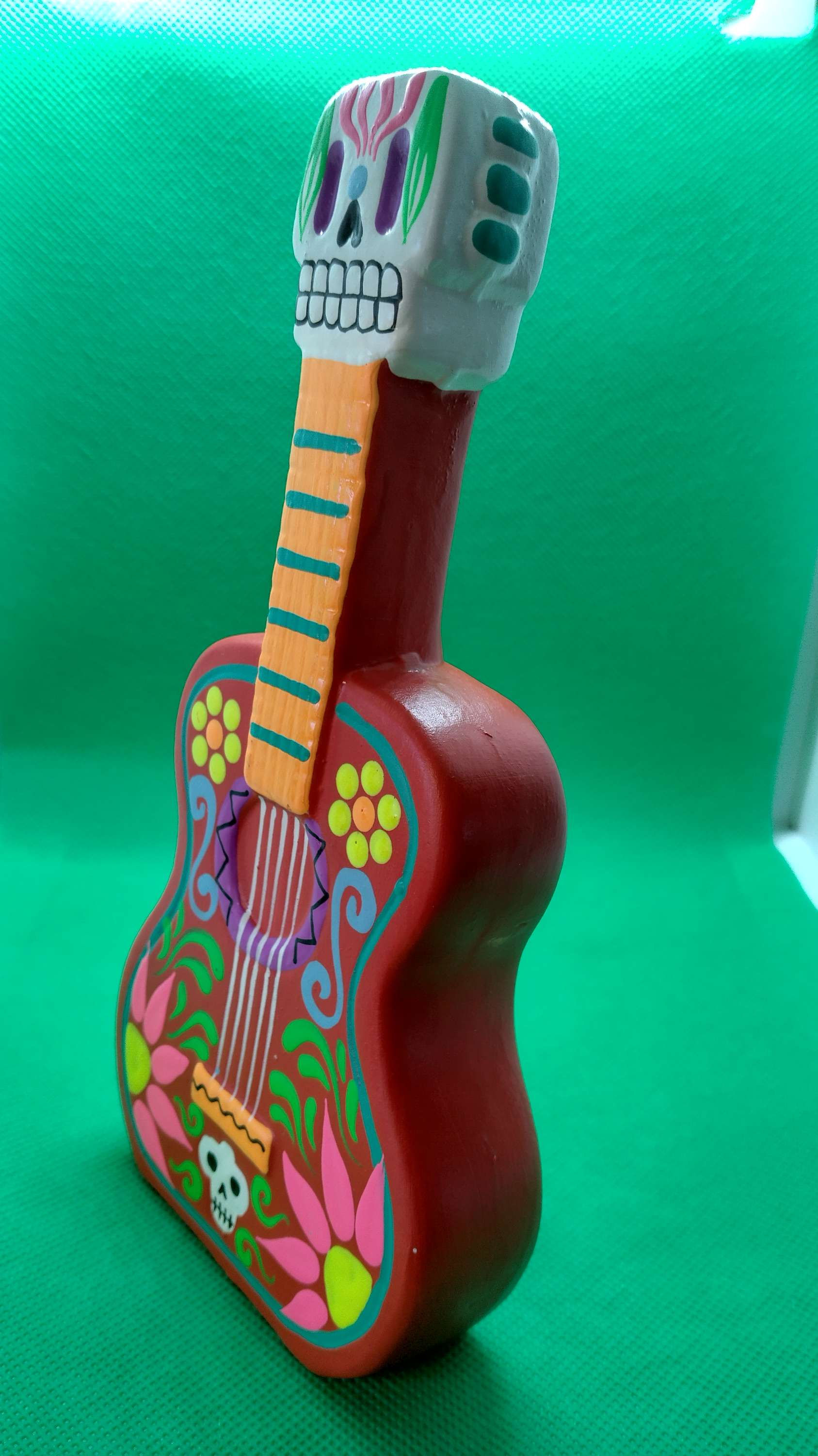 Hand painted guitar Peruvian skeleton ceramic.