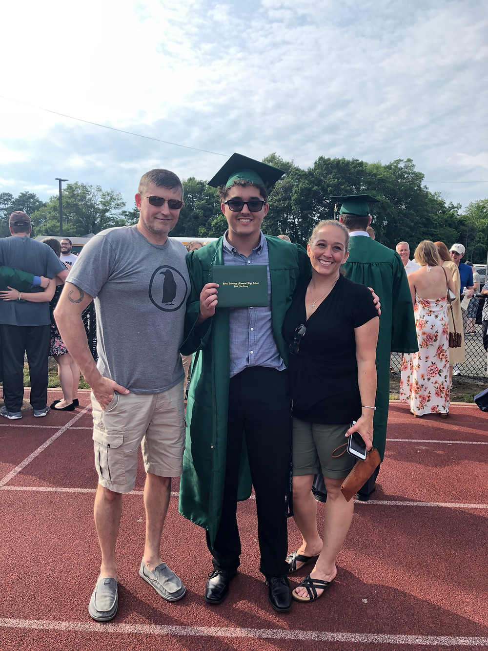 Jake and my parents at his high school graduation