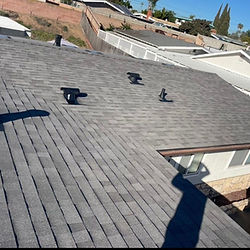 Black shingle roof completed by Christian Roofing.