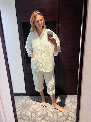 Modeling the pajamas provided by our hotel.