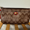 Thumbnail: Coach Peyton Signature go Wristlet. Khaki/Persimmon | Authentic Coach Wallet