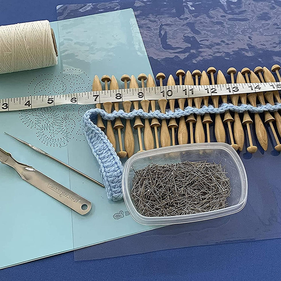 Thumbnail: Wooden bobbins and steel pins from the bobbin lace kit