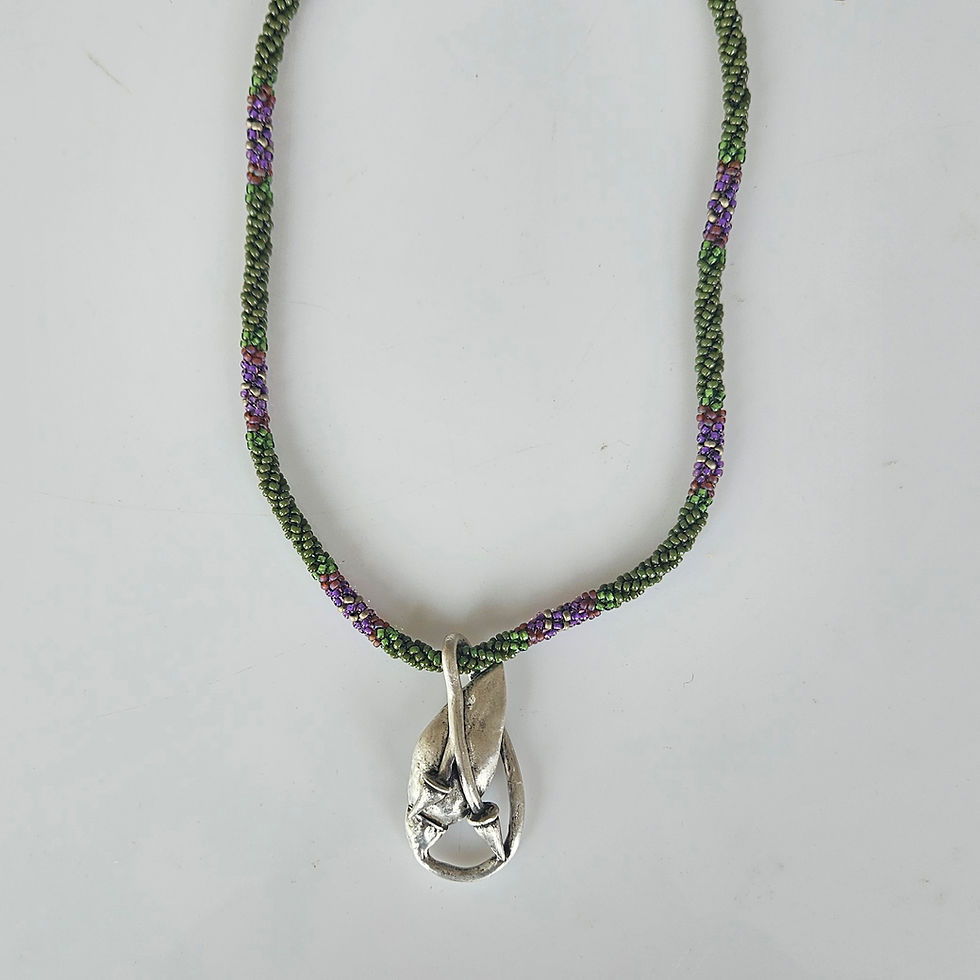 Thumbnail: Silver Flower Bud on Green and Purple Beaded Necklace