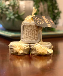 Three wrapped square soaps with 'BEST MUM EVER' tag