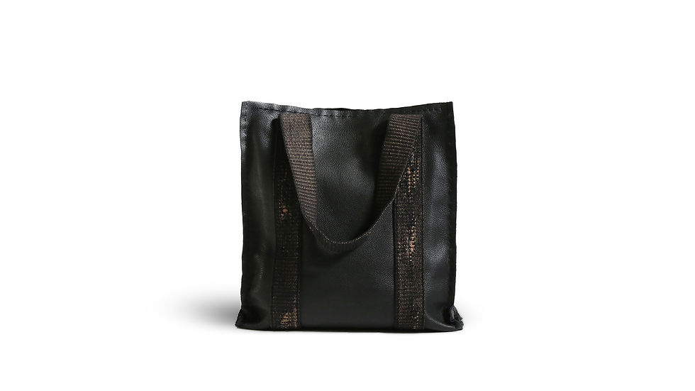 Thumbnail: Spacious but minimal medium size black leather bag, easy to carry all day