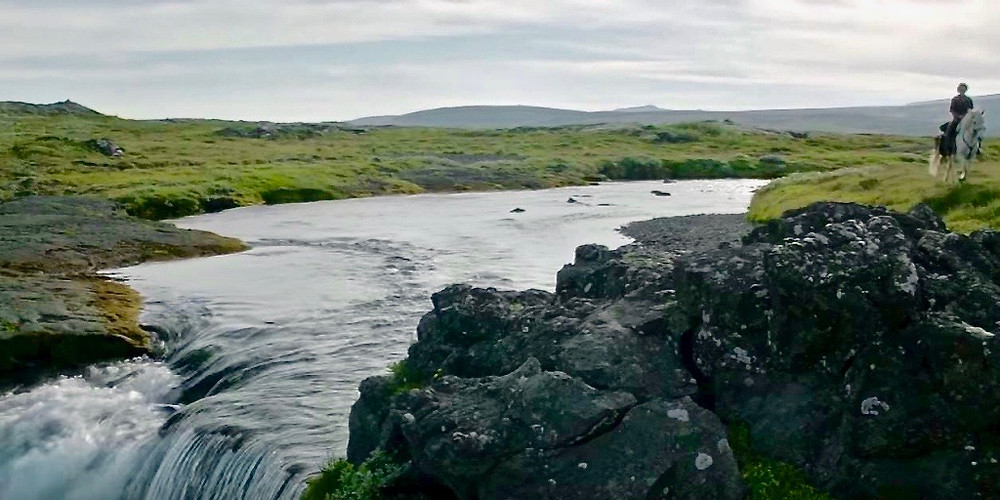 Arya Stark at a waterfall in Thingvellir Park